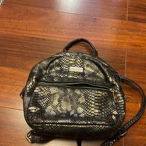 BCBG gold snakeskin back pack